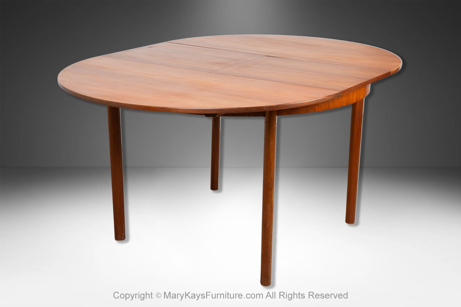 1b595941-b6fc-4c0e-bac9-24dc1c4e3203_Mid-Century-teak-Oval-Extendable-Dining-Table-by-McIntosh-of-Kirkcaldy-10.jpg