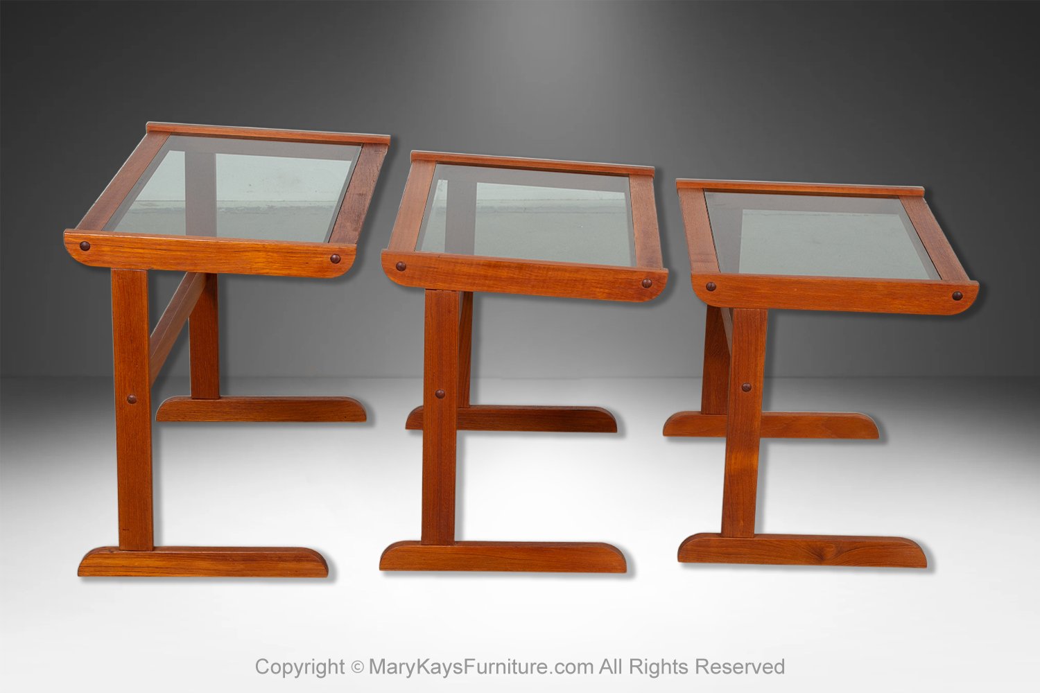 ddb90716-acc0-47dc-b7c4-6aeda8469a7d_Danish-Mid-Century-Teak-glass-top-Nesting-Tables-3-1.jpg