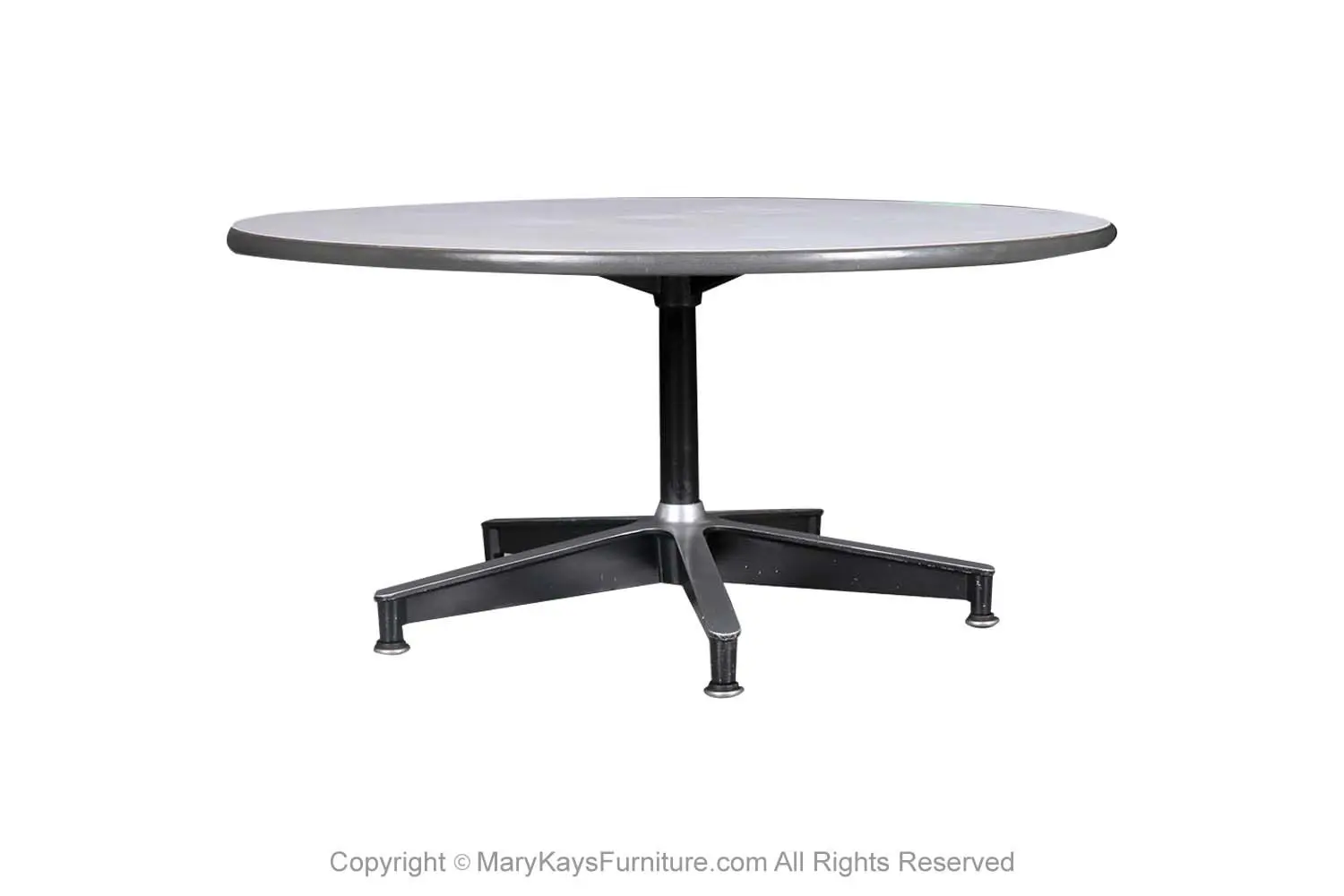 9fd524fe-c955-4f00-bc19-229cf9b1c88c_Mid-Century-Round-Coffee-Table-Charles-Eames-Herman-Miller-1.webp