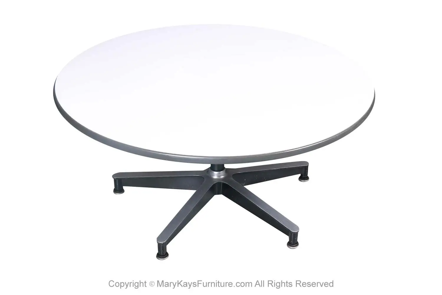 9fd524fe-c955-4f00-bc19-229cf9b1c88c_Mid-Century-Round-Coffee-Table-Charles-Eames-Herman-Miller-11.webp