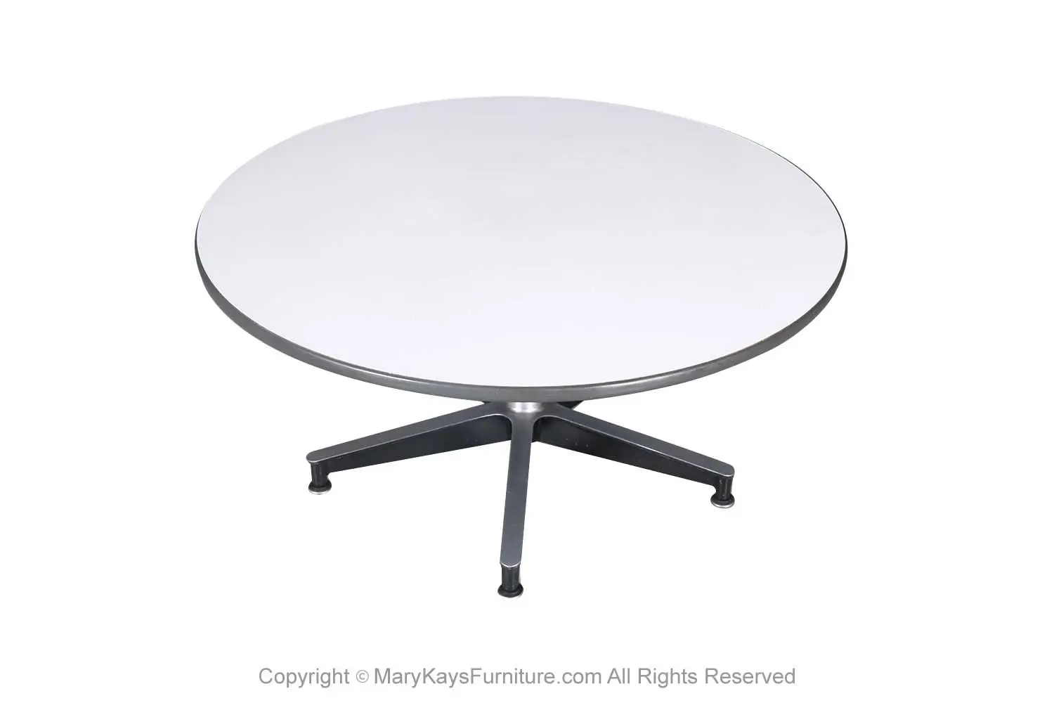 9fd524fe-c955-4f00-bc19-229cf9b1c88c_Mid-Century-Round-Coffee-Table-Charles-Eames-Herman-Miller-3.webp