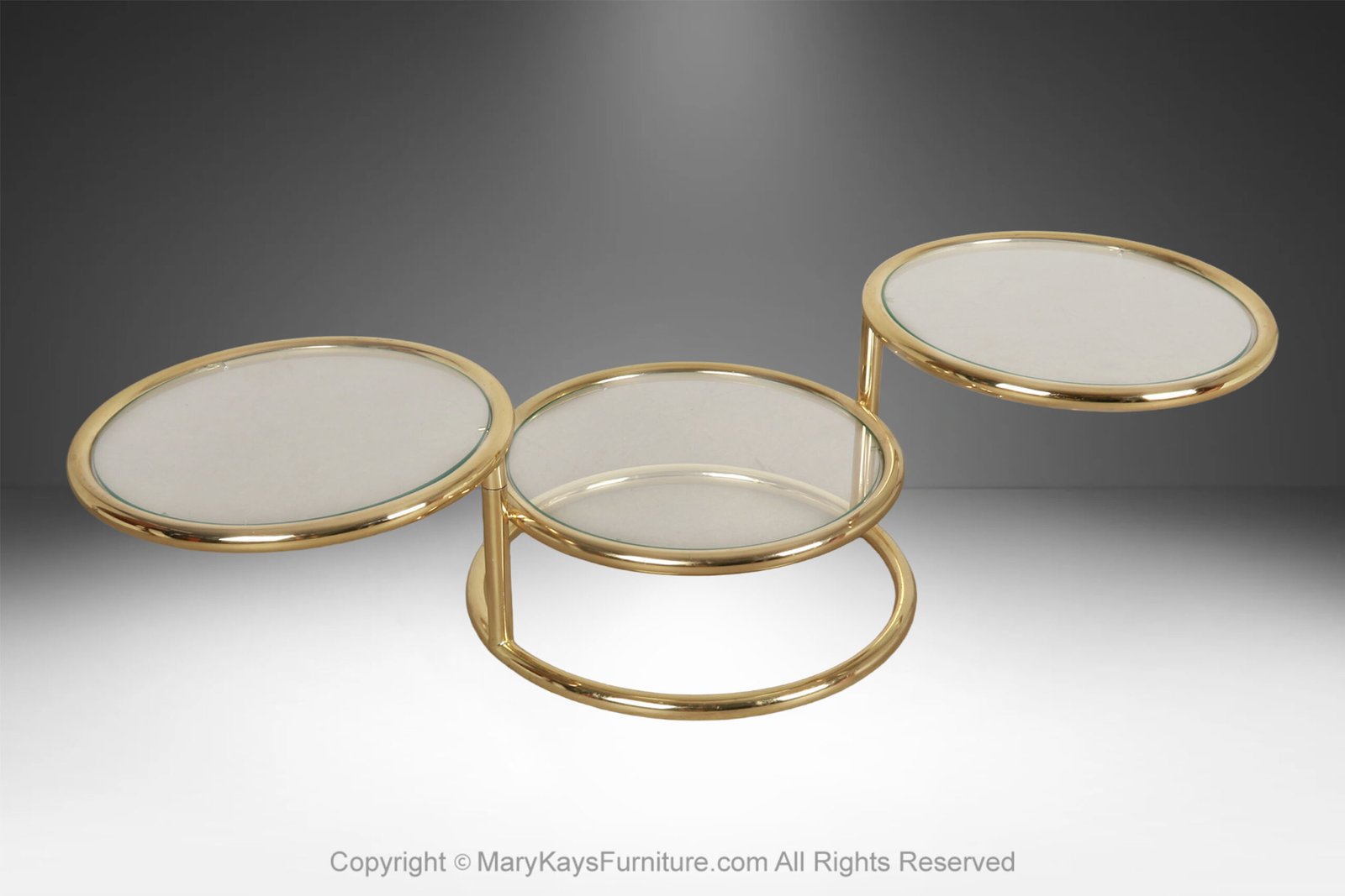 Mid-Century-Modern-brass-glass-swivel-coffee-table-in-the-style-of-Milo-Baughman-11.jpg