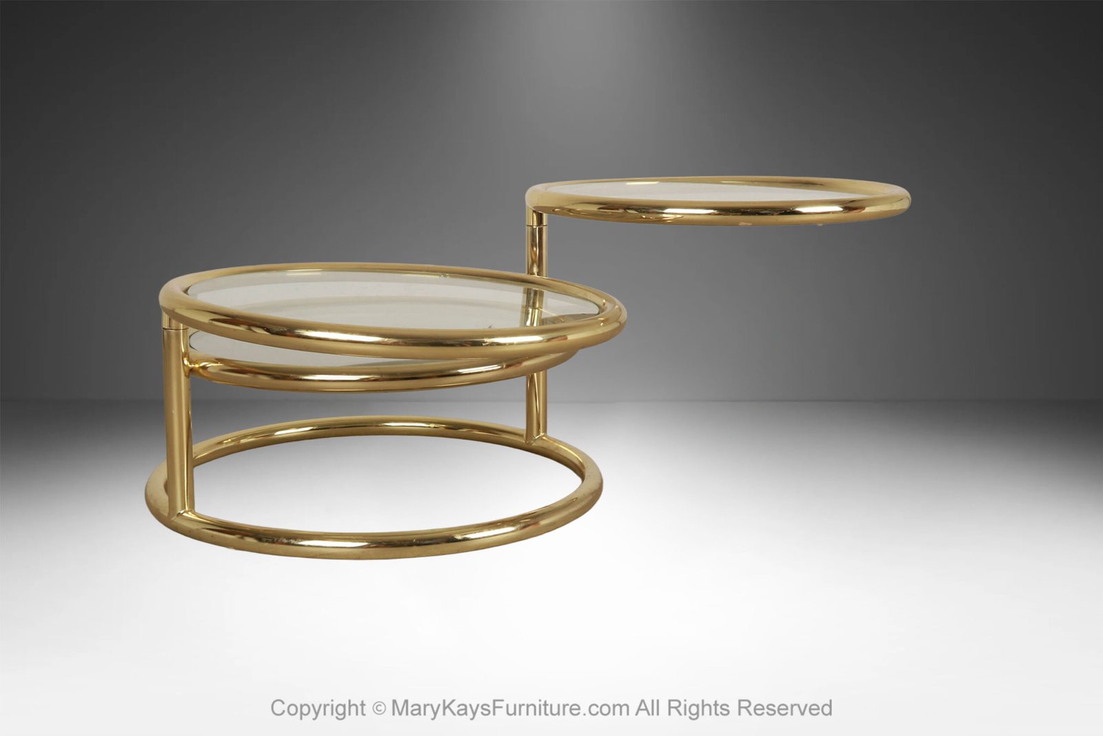 Mid-Century-Modern-brass-glass-swivel-coffee-table-in-the-style-of-Milo-Baughman-2.jpg