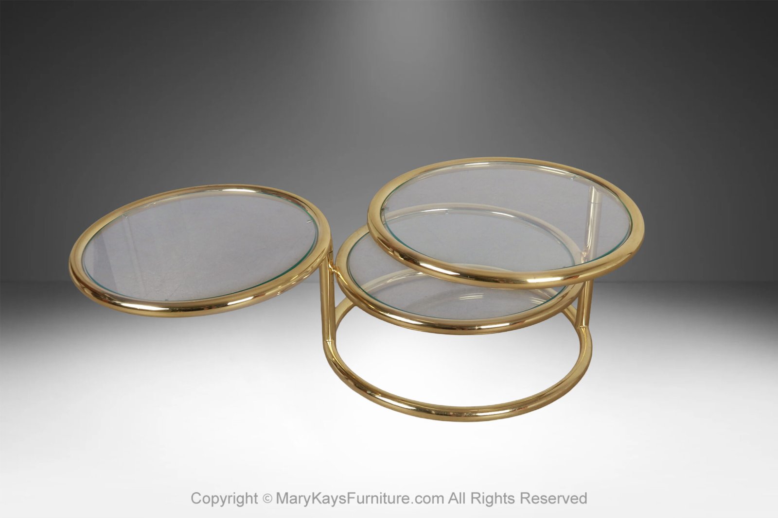 Mid-Century-Modern-brass-glass-swivel-coffee-table-in-the-style-of-Milo-Baughman-3.jpg
