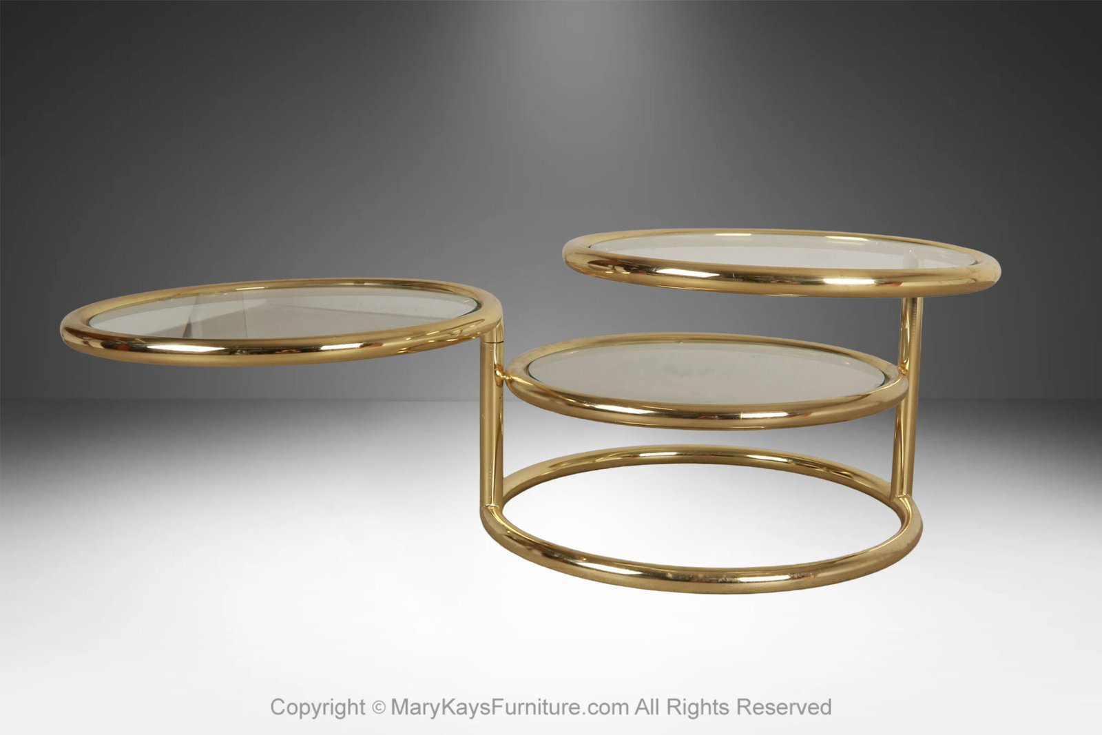 Mid-Century-Modern-brass-glass-swivel-coffee-table-in-the-style-of-Milo-Baughman-4.jpg