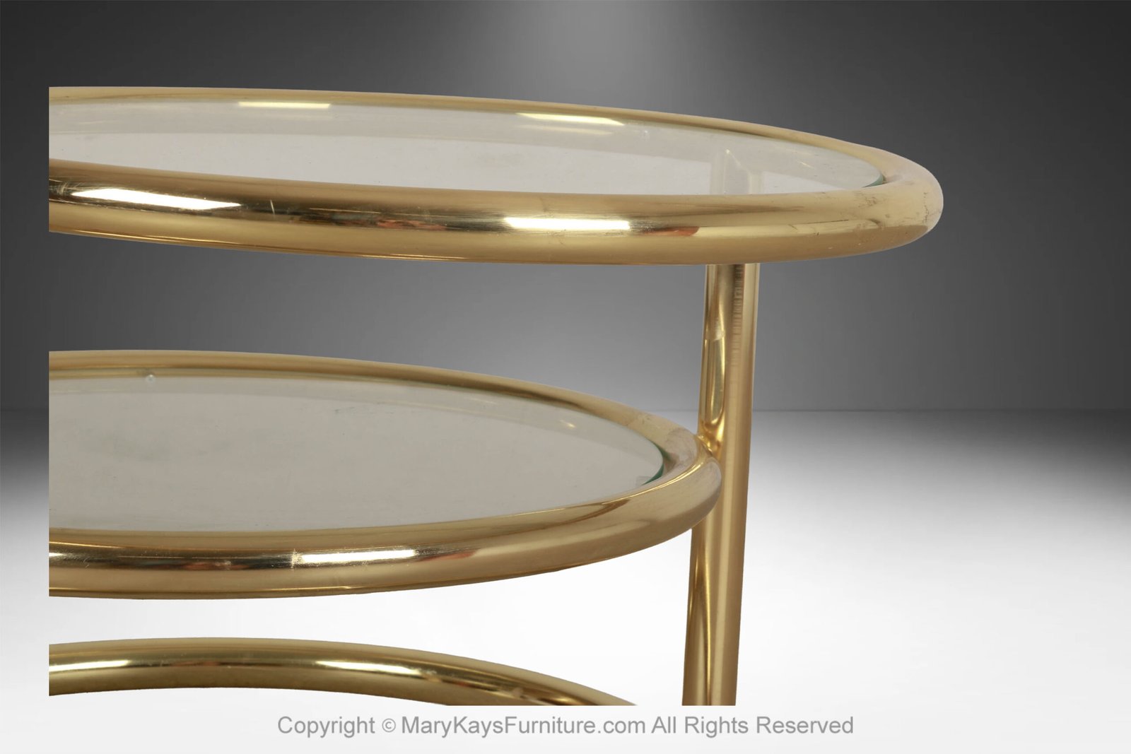Mid-Century-Modern-brass-glass-swivel-coffee-table-in-the-style-of-Milo-Baughman-5.jpg