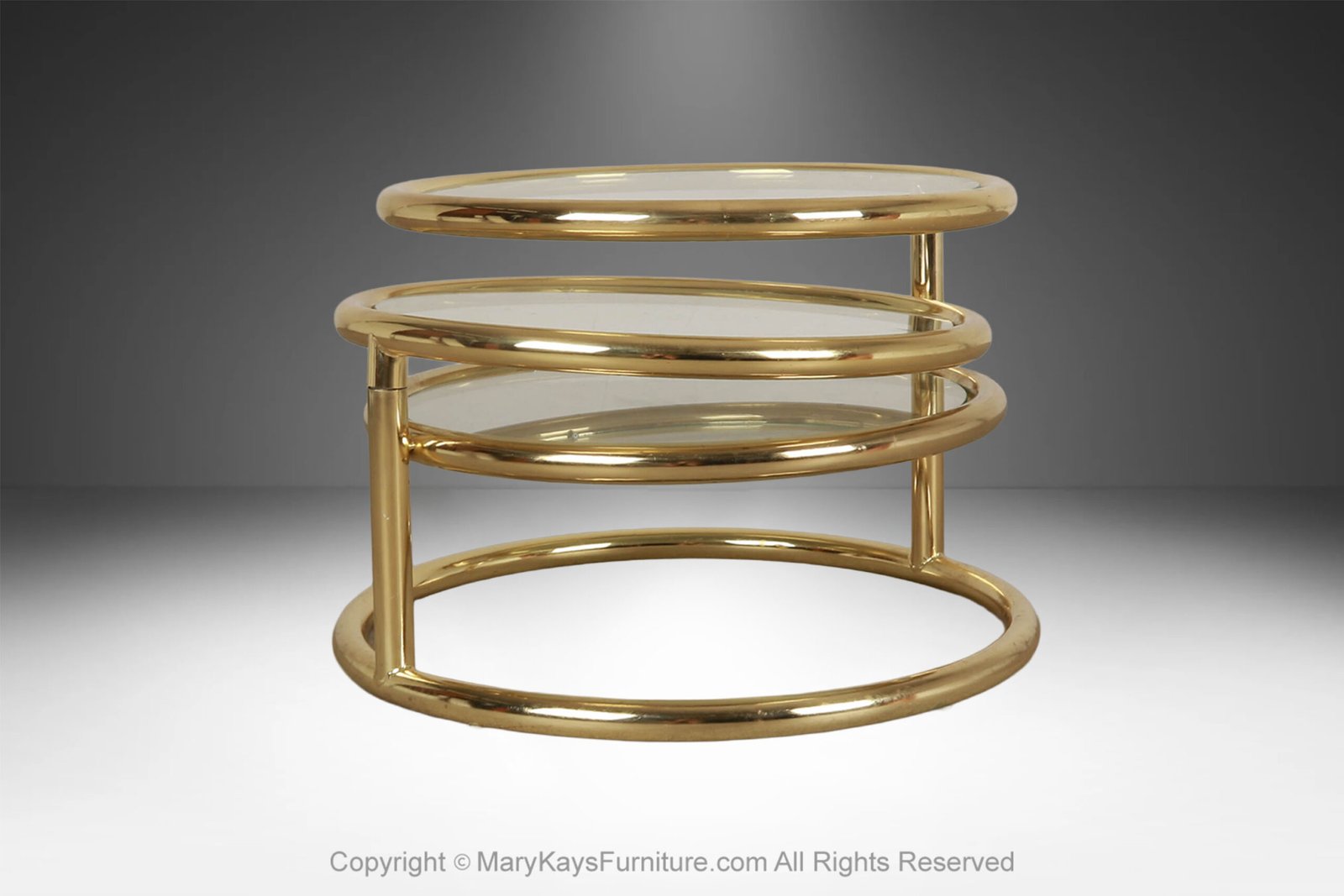 Mid-Century-Modern-brass-glass-swivel-coffee-table-in-the-style-of-Milo-Baughman-9.jpg