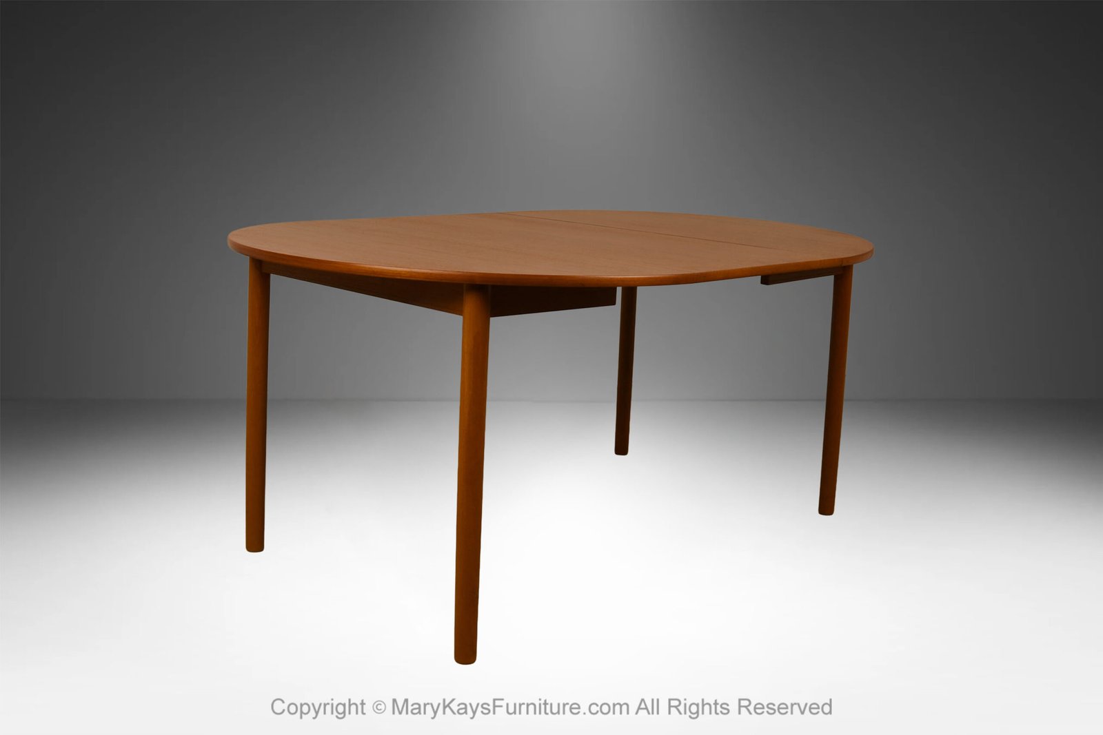 Mid-Century-teak-Round-Oval-Extendable-Dining-Table-10.jpg