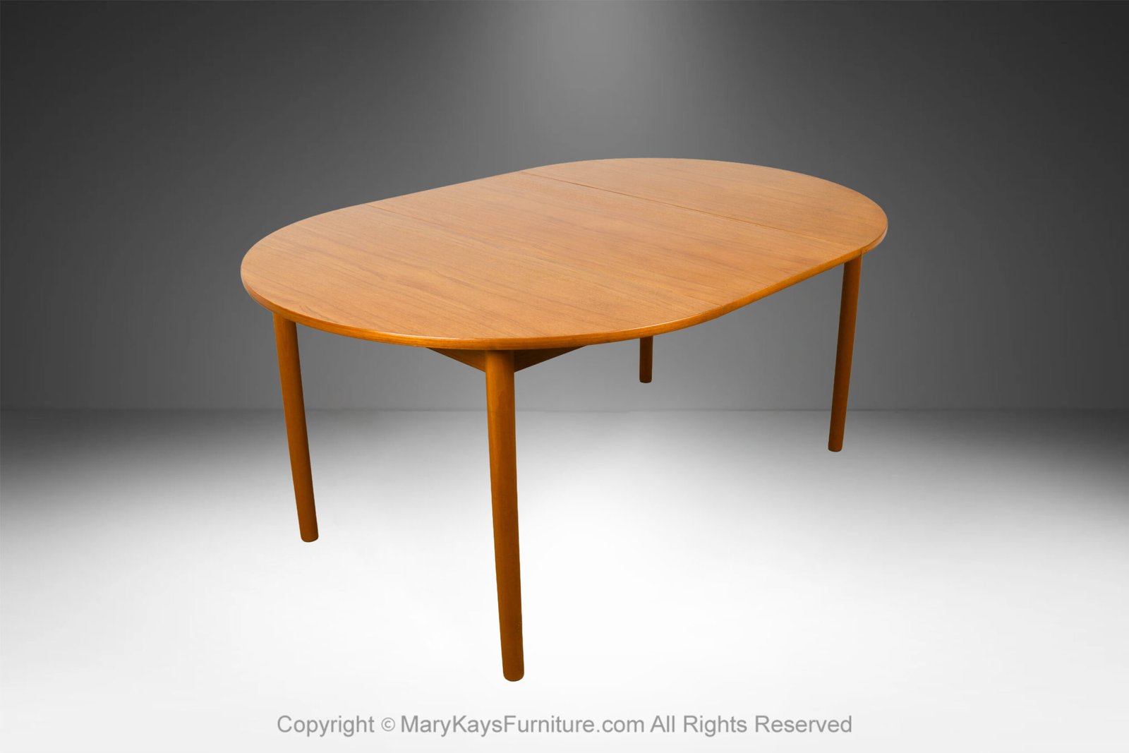 Mid-Century-teak-Round-Oval-Extendable-Dining-Table-11.jpg