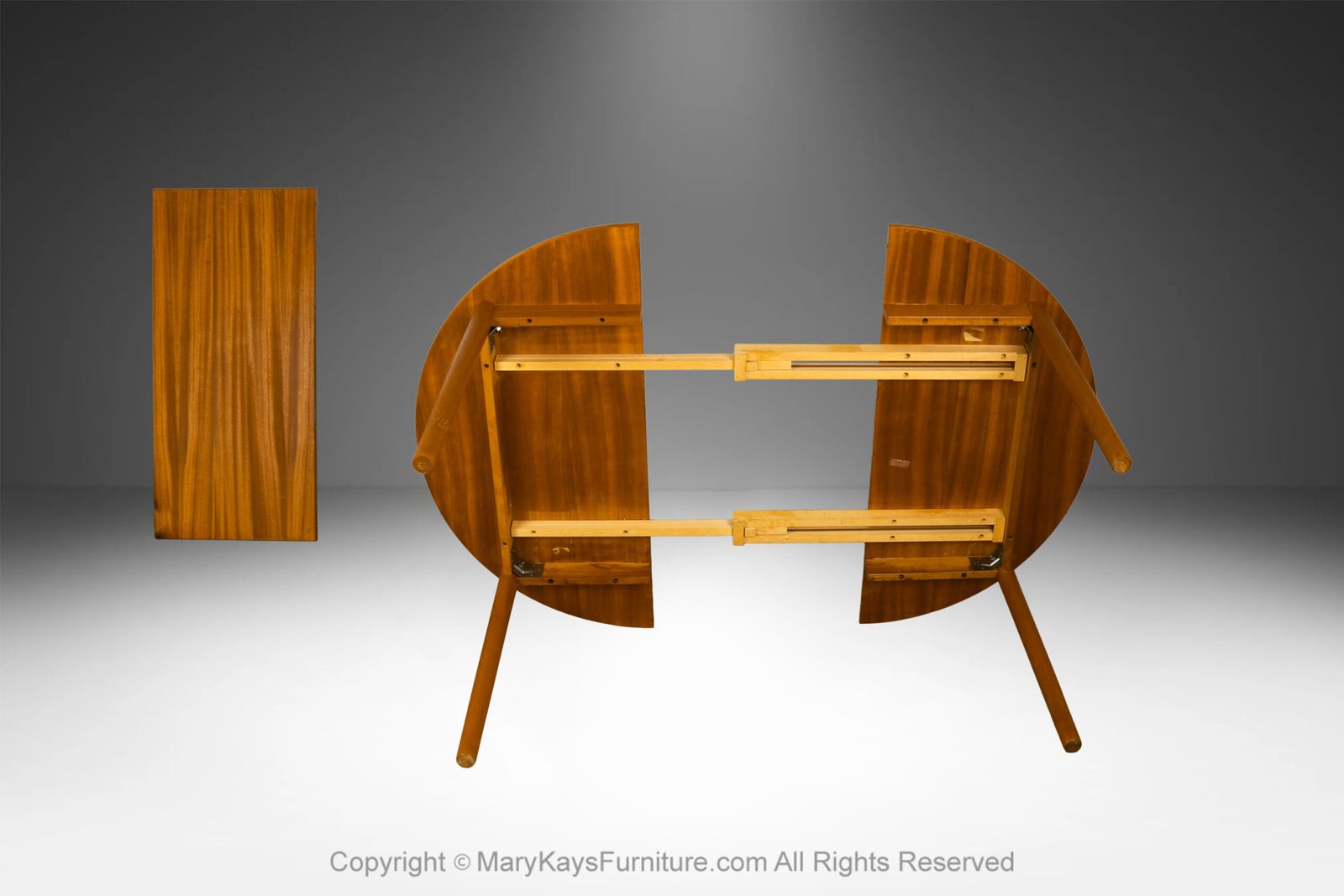 Mid-Century-teak-Round-Oval-Extendable-Dining-Table-2.jpg