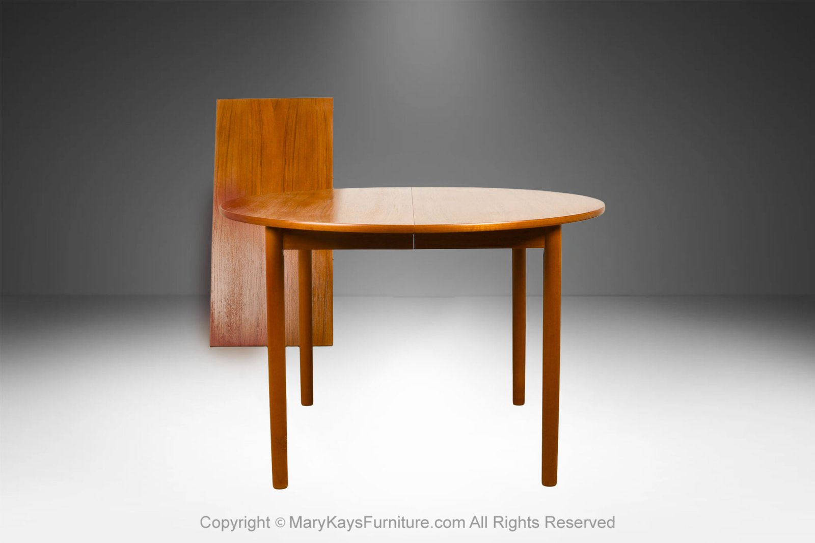 Mid-Century-teak-Round-Oval-Extendable-Dining-Table-6.jpg