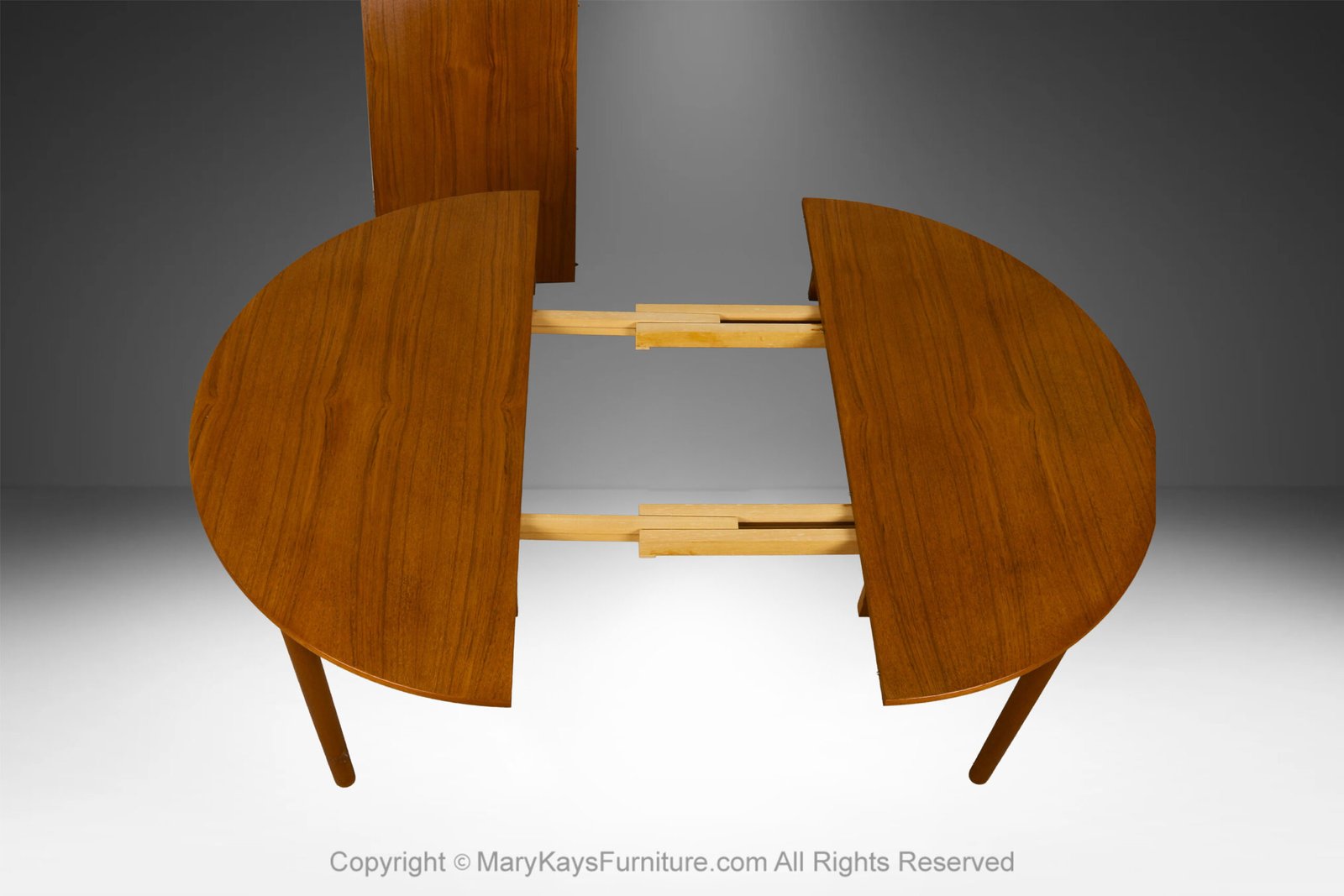Mid-Century-teak-Round-Oval-Extendable-Dining-Table-7.jpg
