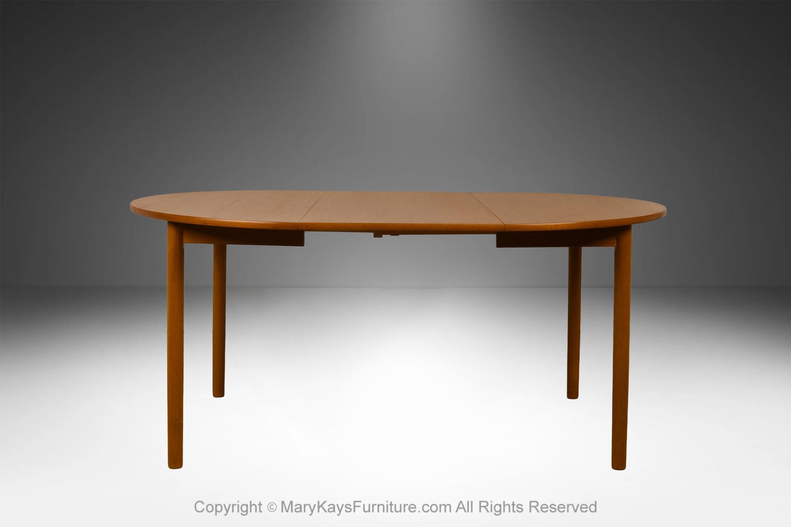 Mid-Century-teak-Round-Oval-Extendable-Dining-Table-8.jpg